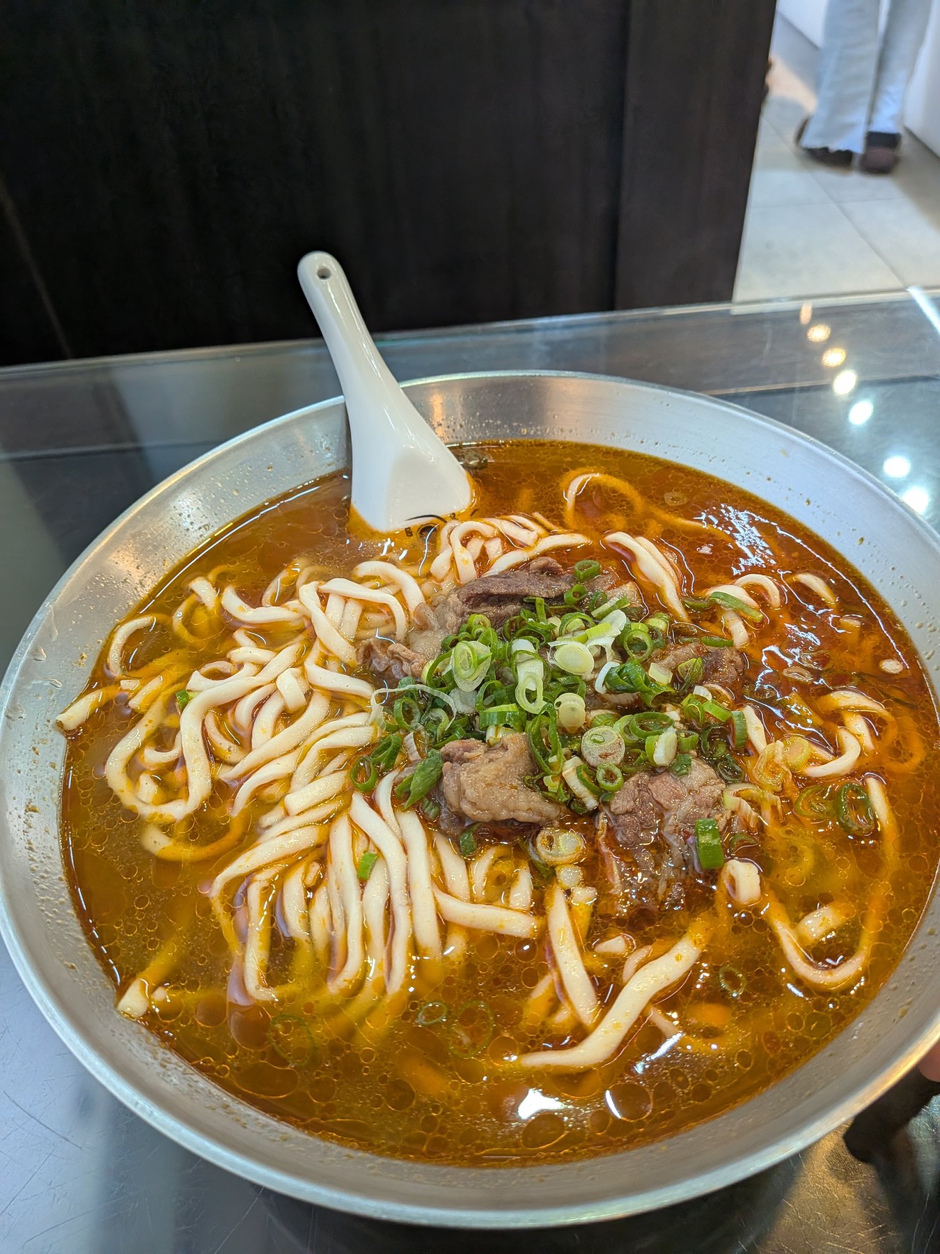 A bowl of beef noodles after the Jiuwu Peak hike.