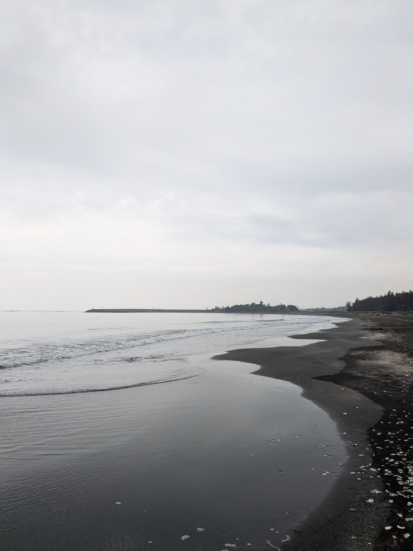 Grey-sky beach at Yuguang Island near Tainan.